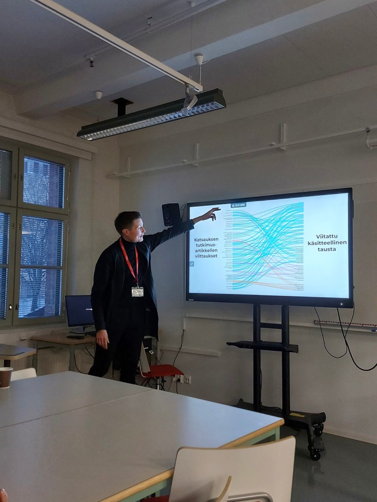 Picture of me presenting the preliminary findings of our research